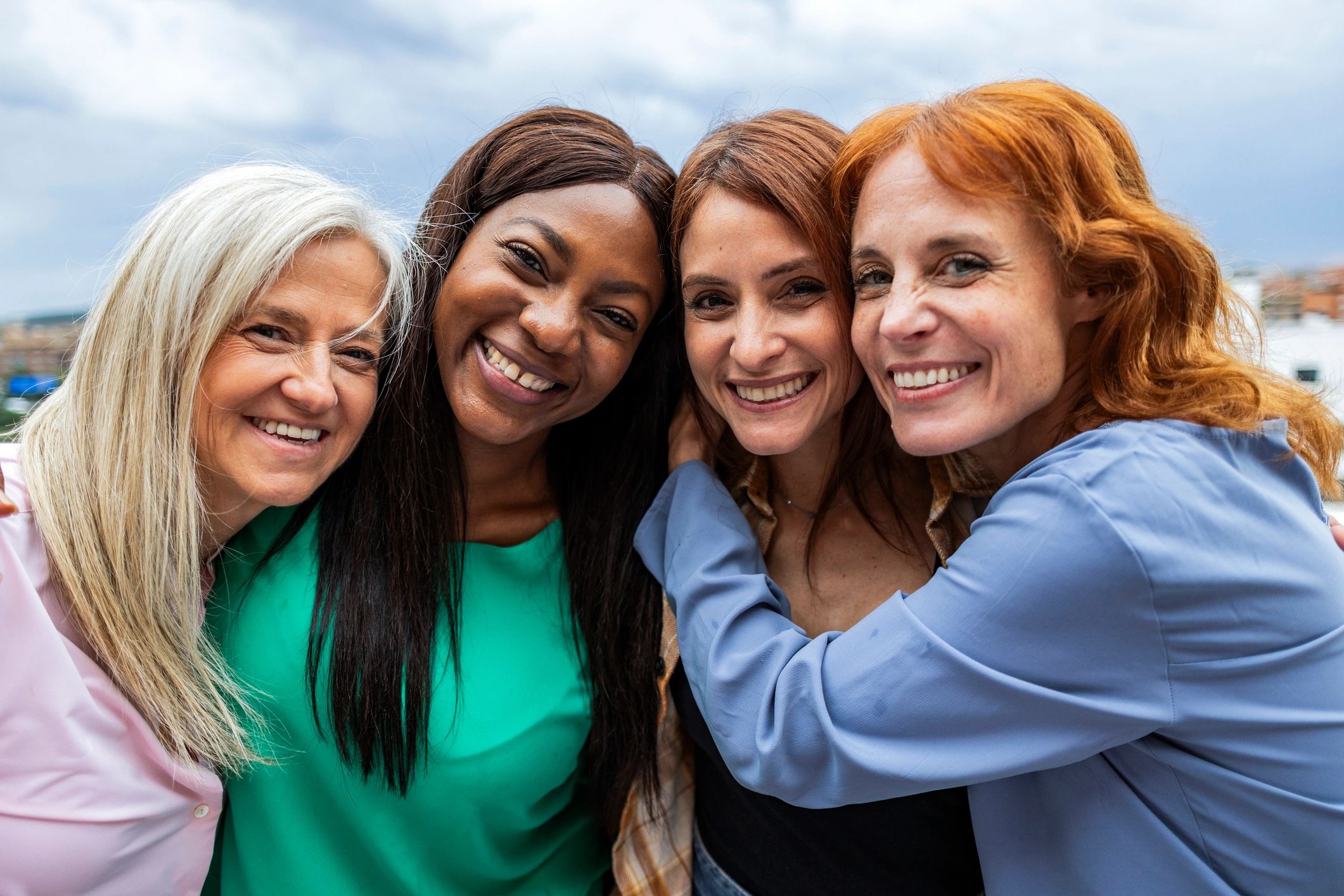 Women embracing in solidarity