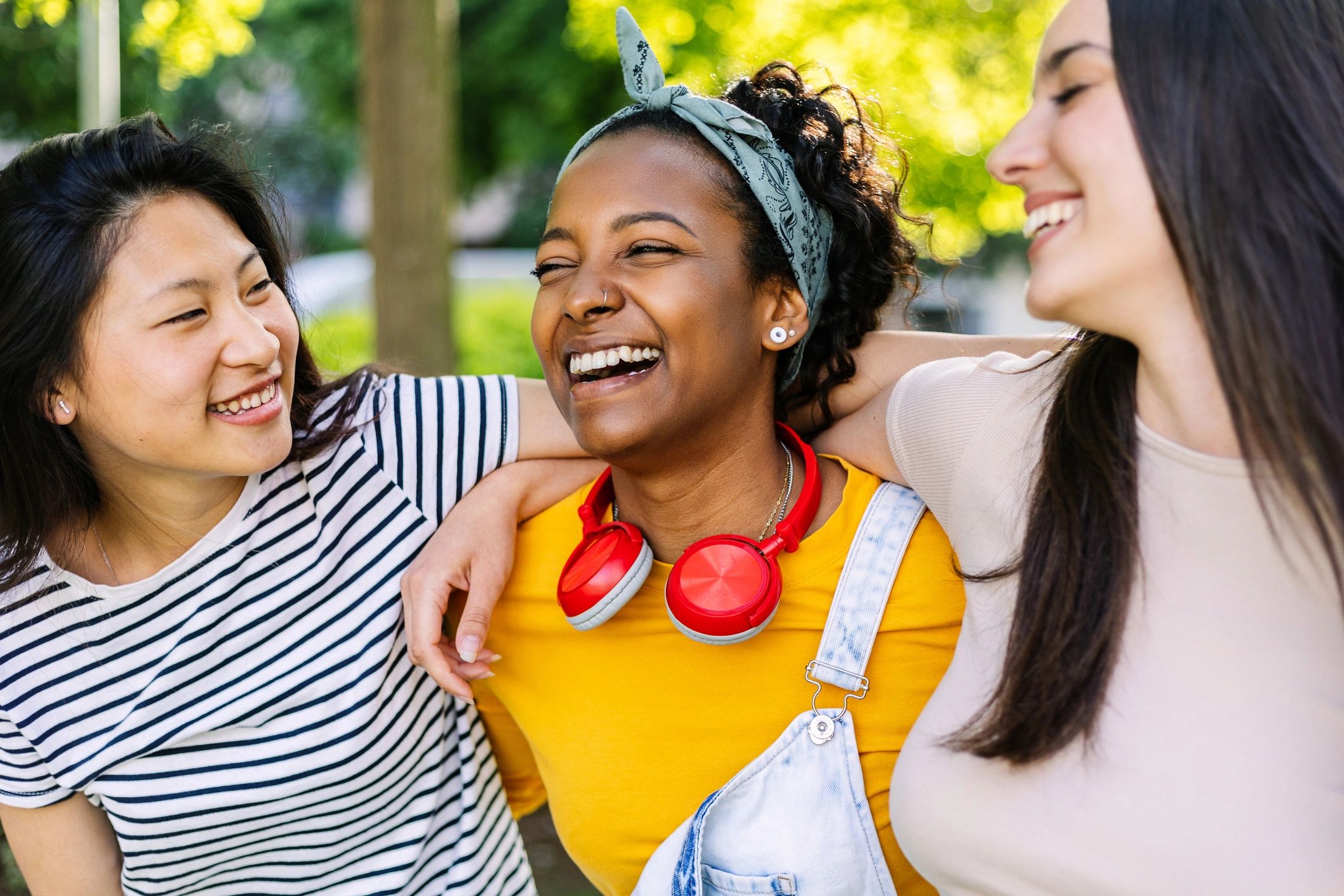 Women sharing joy and friendship outdoors