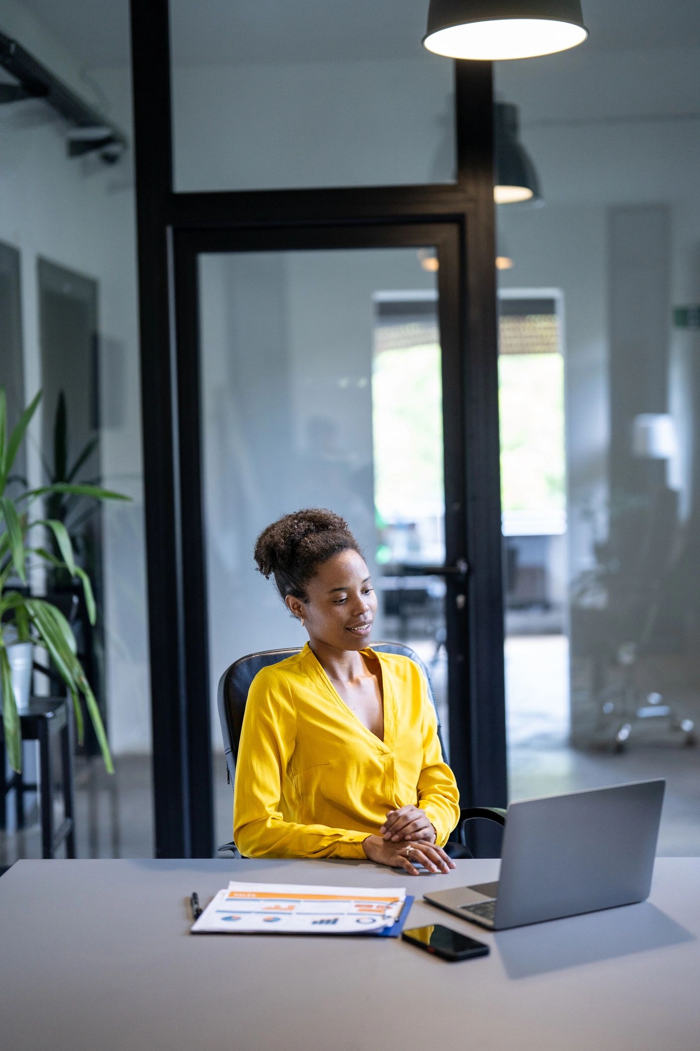 Woman in thoughtful leadership setting